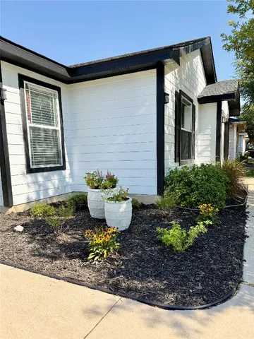 a view of a entryway door front of house