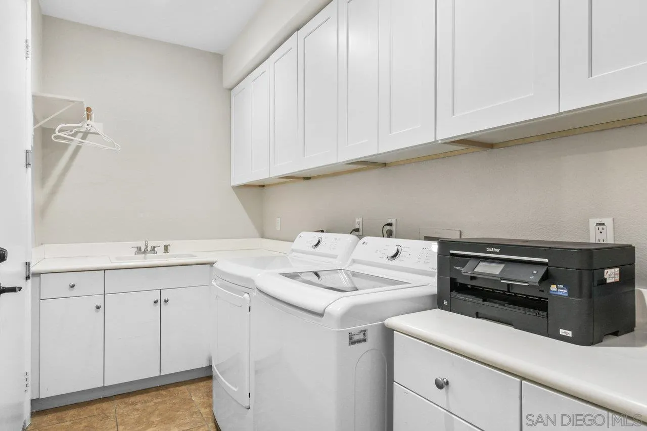 2957 Ranch Gate Road Chula Vista, CA 91914 - Photo 25 of 75 a utility room with sink dryer and washer