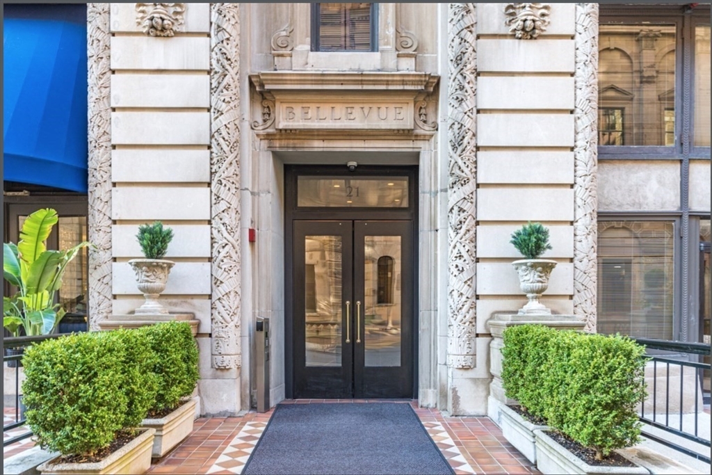 21 Beacon Street, Unit 7L Boston, MA 02108 - Photo 1 of 18 a view of front door of house with a yard