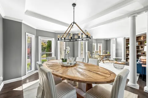 a kitchen with stainless steel appliances granite countertop a stove and cabinets