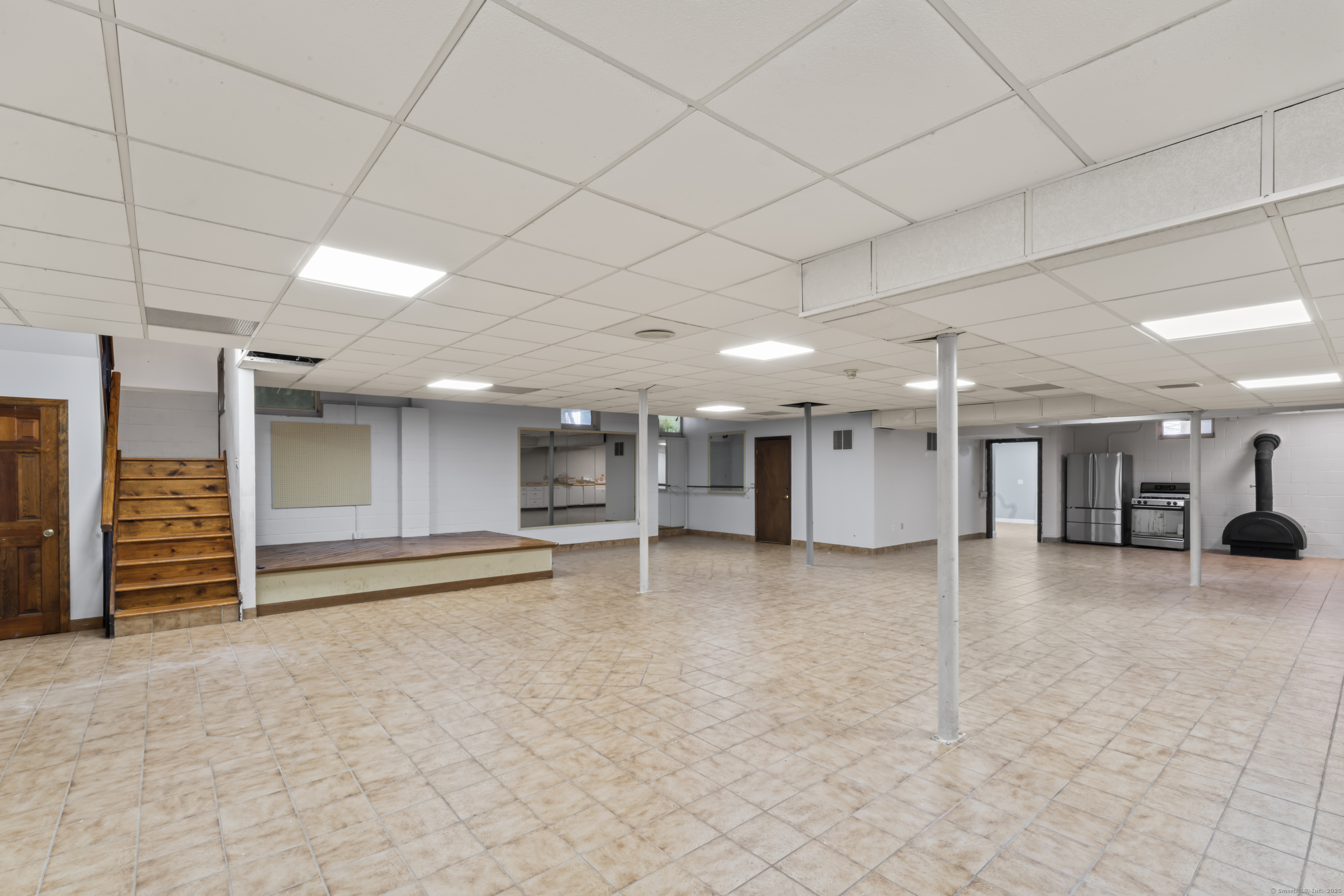 501 Woodbine Road Stamford, CT 06903 - Photo 18 of 37 a view of a hall with stairs