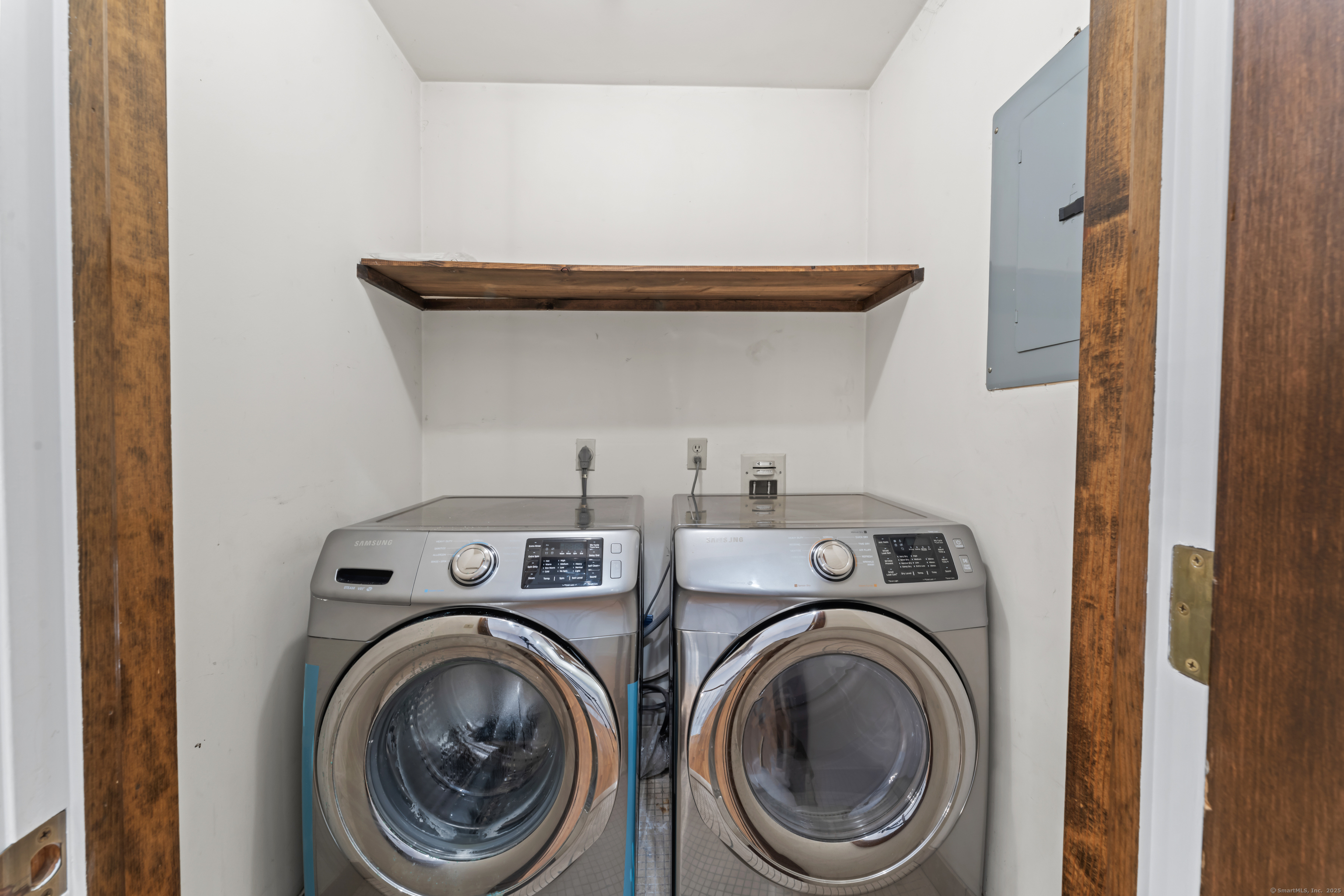501 Woodbine Road Stamford, CT 06903 - Photo 30 of 37 a utility room with dryer and washer