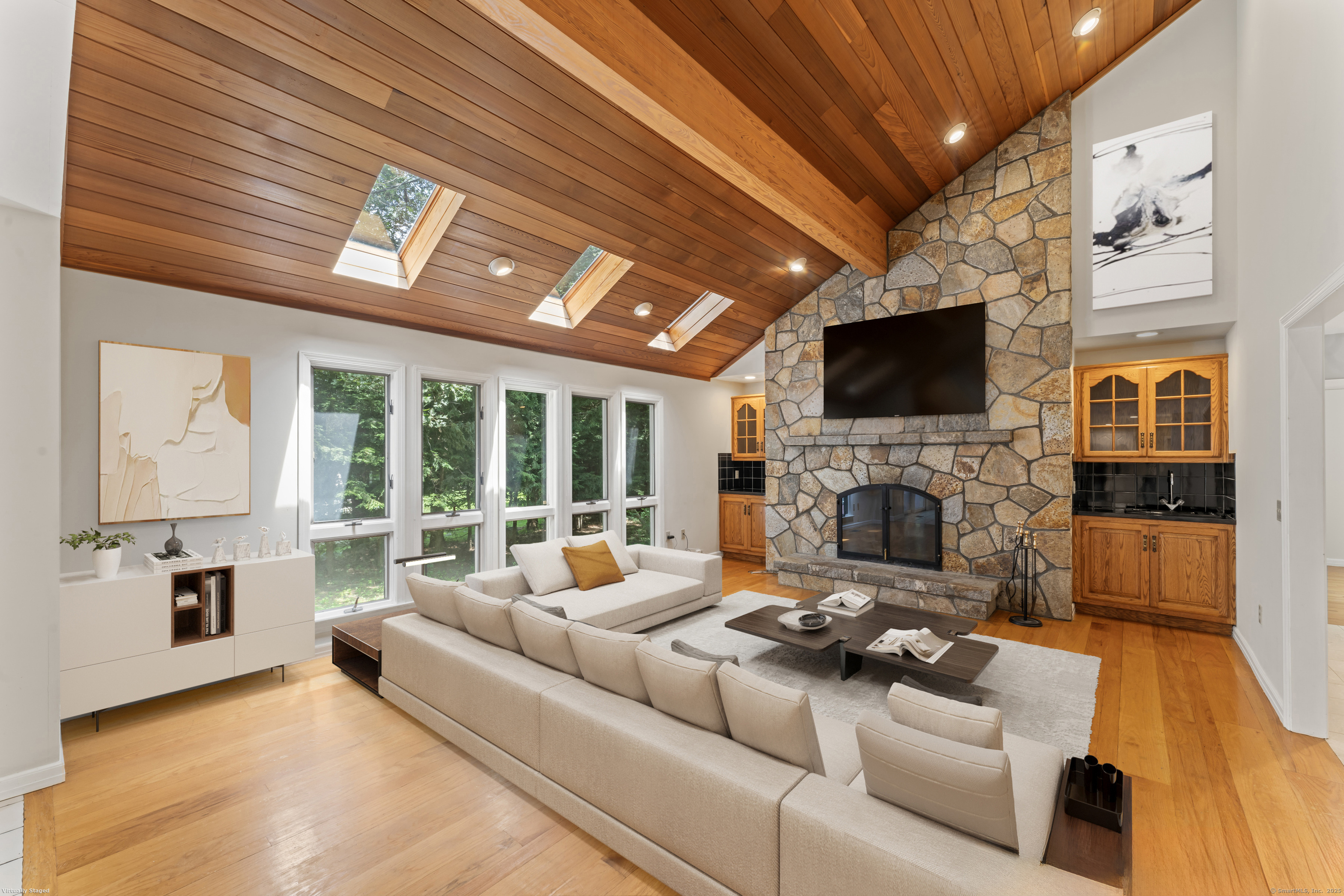 501 Woodbine Road Stamford, CT 06903 - Photo 3 of 37 a living room with furniture and a flat screen tv