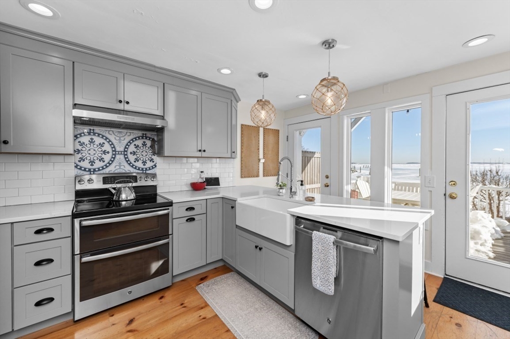 171 Coleridge Street Boston, MA 02128 - Photo 13 of 30 a kitchen with a stove oven and sink