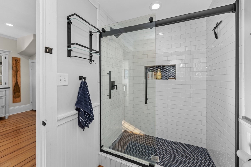 171 Coleridge Street Boston, MA 02128 - Photo 15 of 30 a bathroom with a shower and a shower