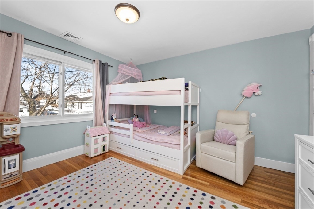 171 Coleridge Street Boston, MA 02128 - Photo 18 of 30 a bedroom with furniture and a window