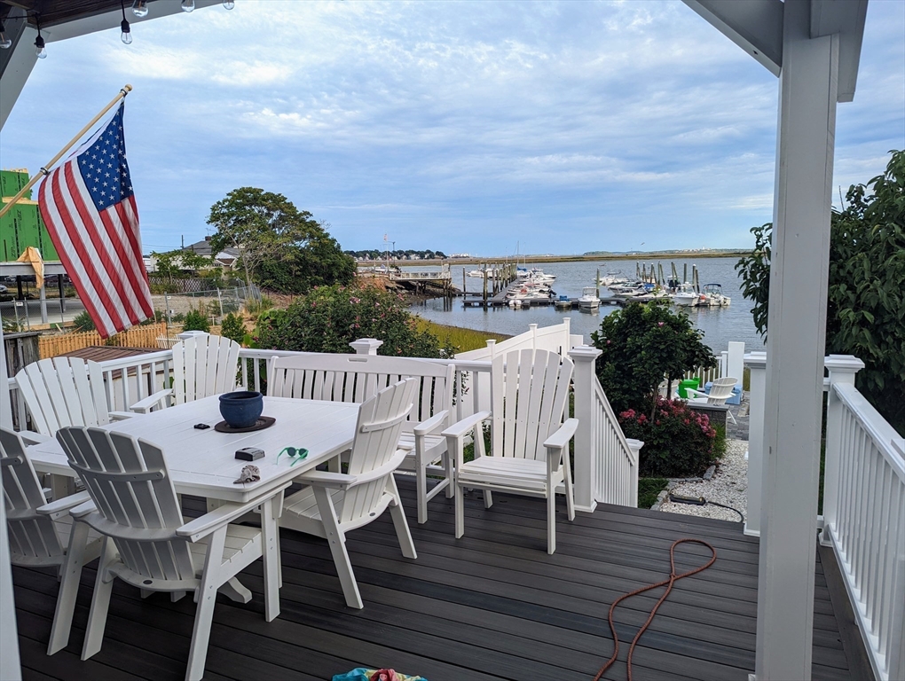 171 Coleridge Street Boston, MA 02128 - Photo 27 of 30 a view of a chairs and table on the terrace