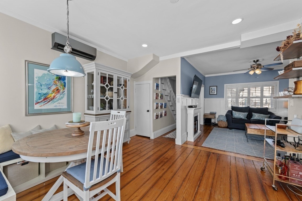 171 Coleridge Street Boston, MA 02128 - Photo 9 of 30 a view of a dining room with furniture and wooden floor