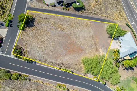 a view of a swimming pool with a bench