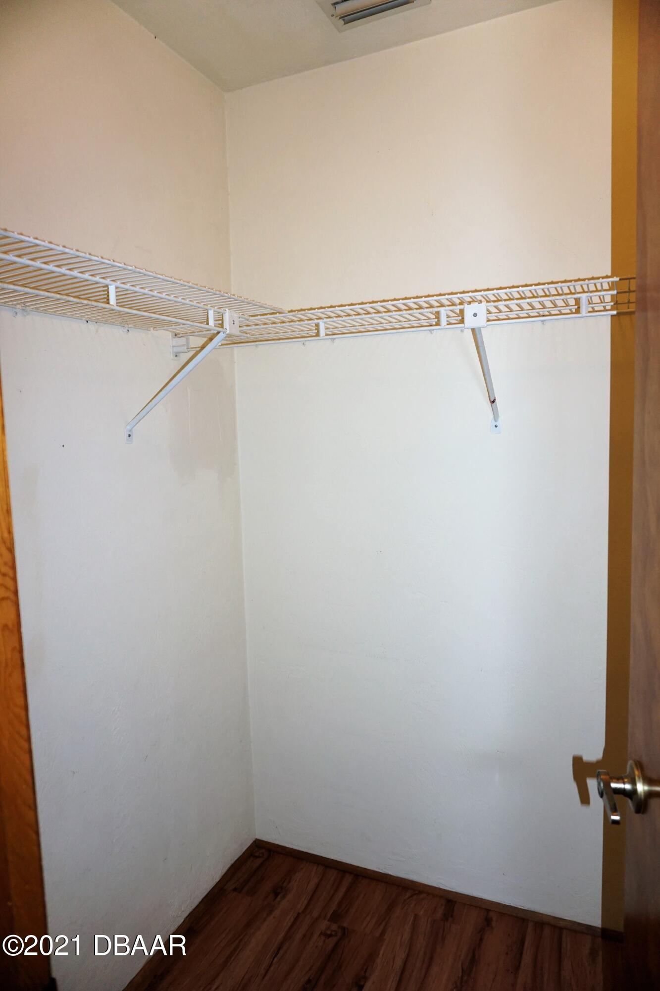 12 Charleston Square Ormond Beach, FL 32174 - Photo 18 of 26 a view of small space with racks on the wall