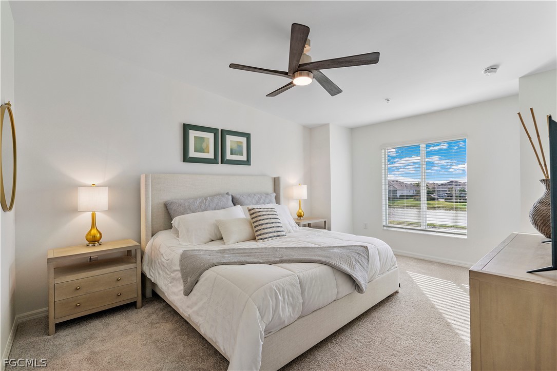 43996 Boardwalk Loop, Unit 1422 Punta Gorda, FL 33982 - Photo 16 of 37 a bedroom with a bed and a window
