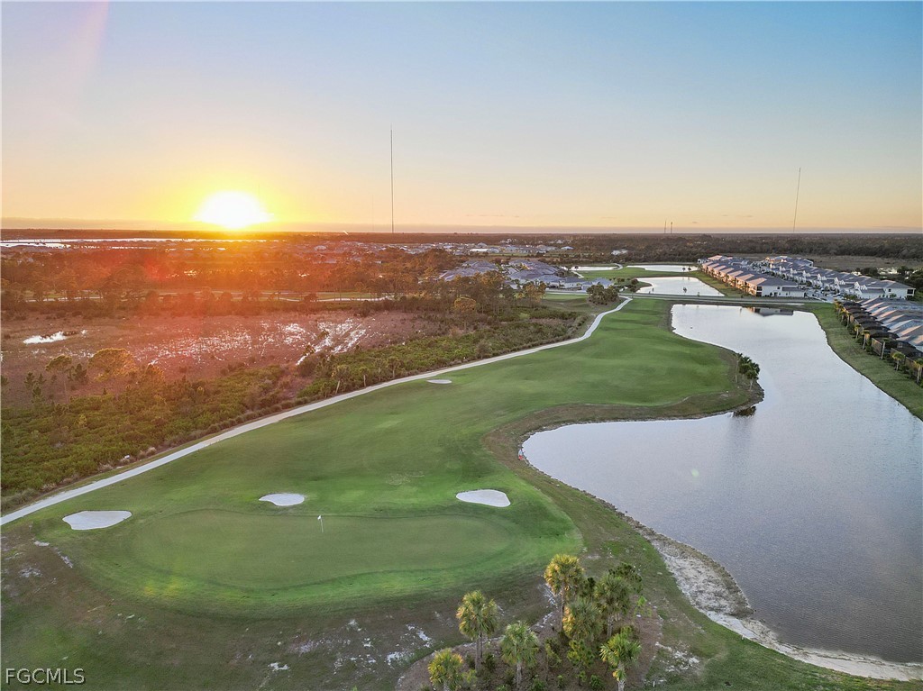 43996 Boardwalk Loop, Unit 1422 Punta Gorda, FL 33982 - Photo 31 of 37 an aerial view of a houses with a yard