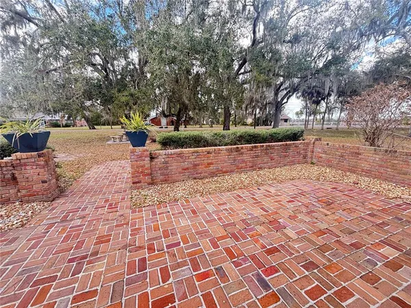 wooden floor and dining room in a hall with an entryway