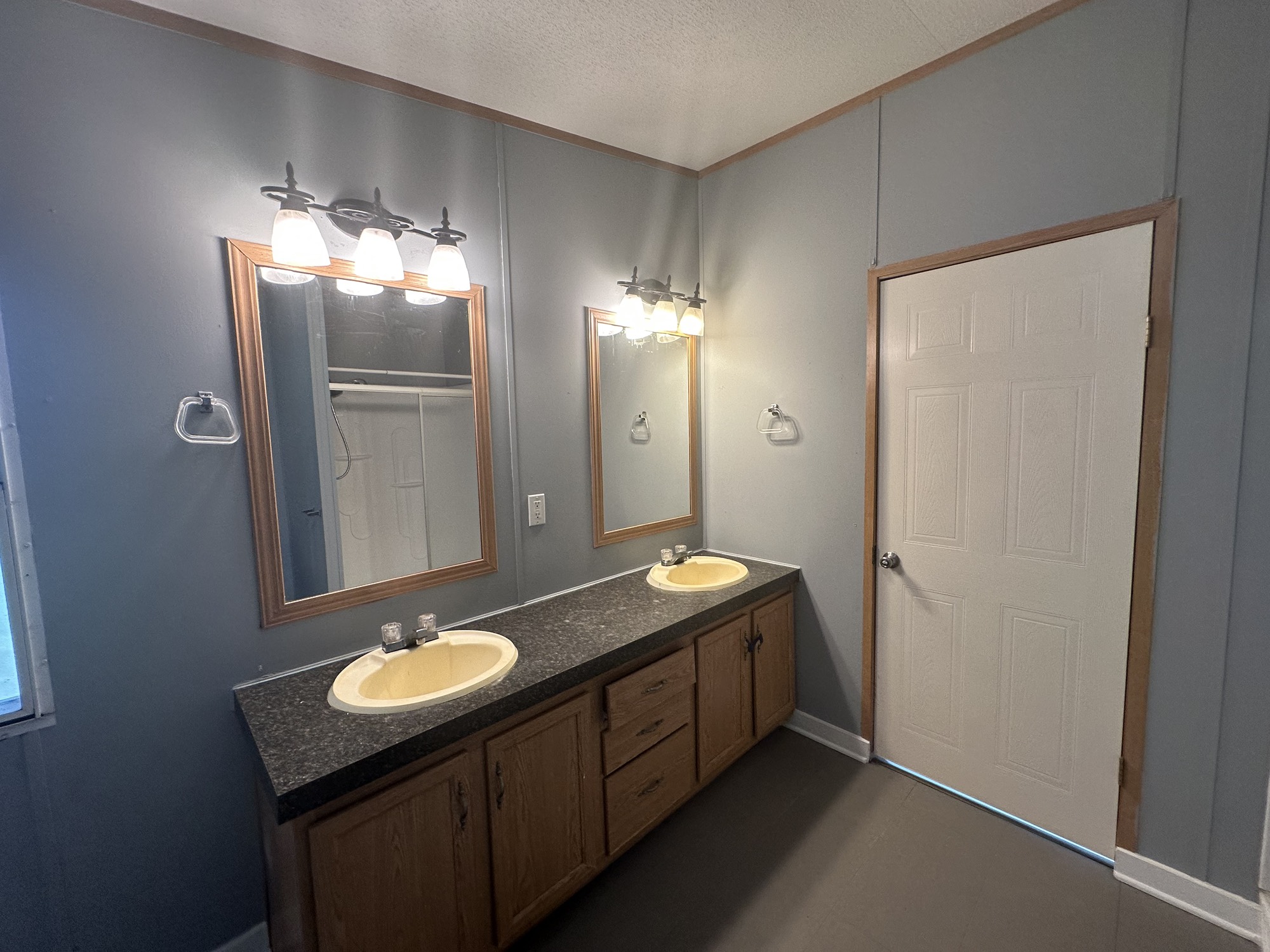 2229 Meekins Road Cleveland, TX 77328 - Photo 15 of 48 a bathroom with a sink and mirror