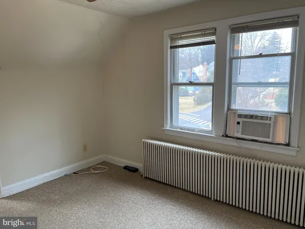 a view of empty room with a window
