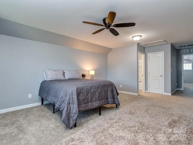 a bathroom with a sink toilet and vanity