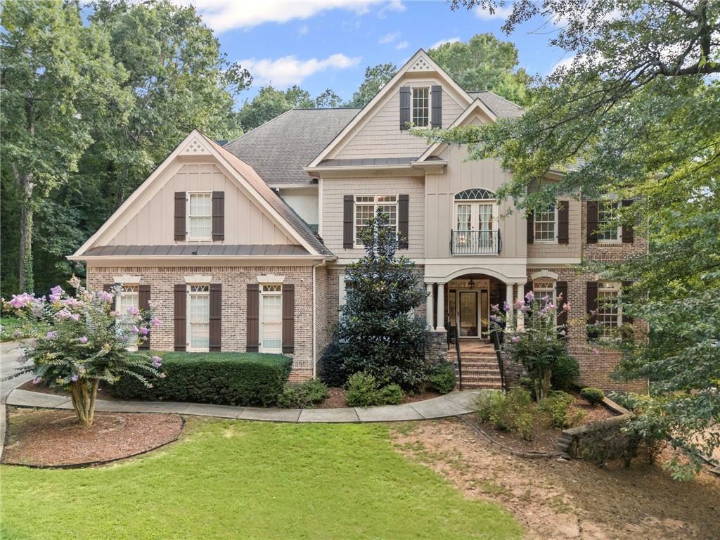 5053 Chapel Crossing Road Douglasville, GA 30135 - Photo 2 of 94 a front view of a house with a yard