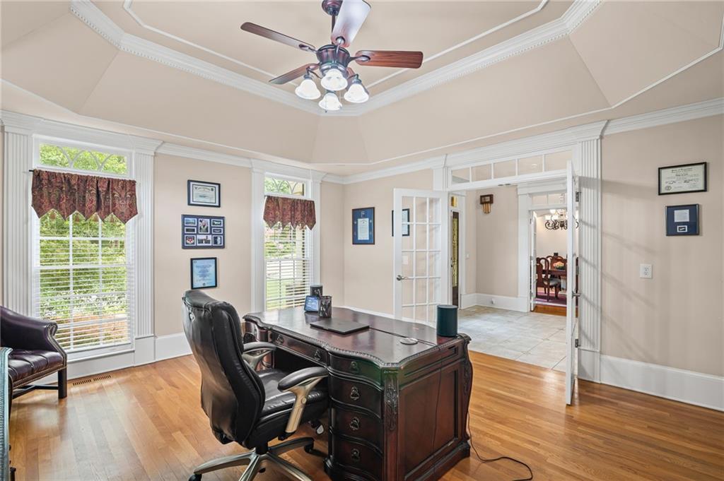5053 Chapel Crossing Road Douglasville, GA 30135 - Photo 26 of 94 a view of a dining room with furniture window and wooden floor