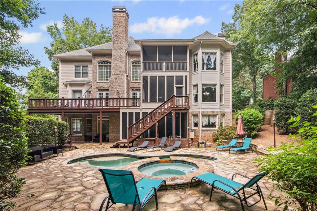 5053 Chapel Crossing Road Douglasville, GA 30135 - Photo 3 of 94 a view of a house with swimming pool and sitting area