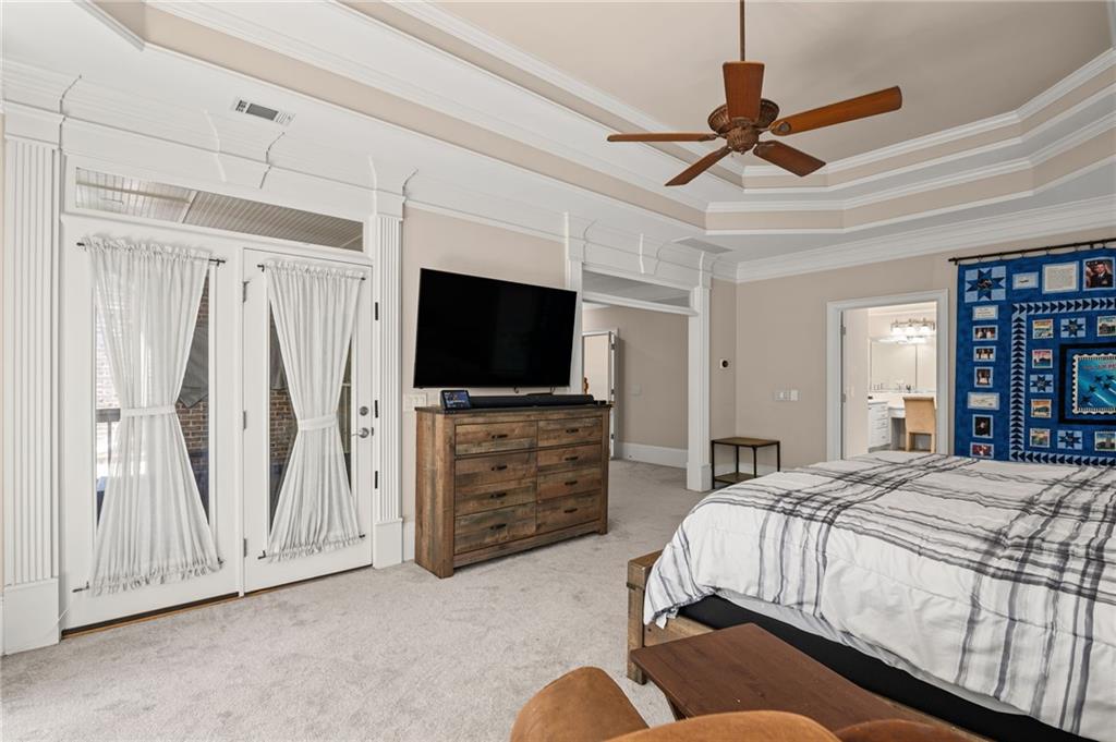 5053 Chapel Crossing Road Douglasville, GA 30135 - Photo 34 of 94 a bedroom with a bed and a flat screen tv