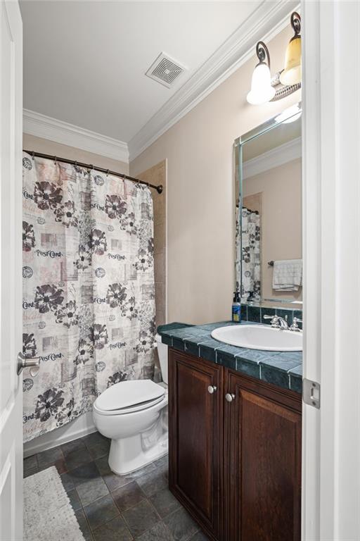 5053 Chapel Crossing Road Douglasville, GA 30135 - Photo 42 of 94 a bathroom with a sink toilet and shower