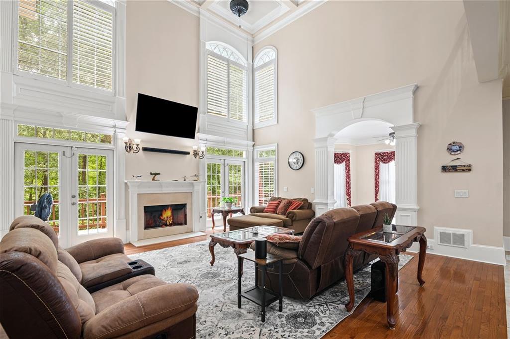 5053 Chapel Crossing Road Douglasville, GA 30135 - Photo 5 of 94 a living room with furniture fireplace and flat screen tv