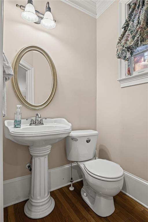 5053 Chapel Crossing Road Douglasville, GA 30135 - Photo 63 of 94 a bathroom with a toilet a sink and a mirror