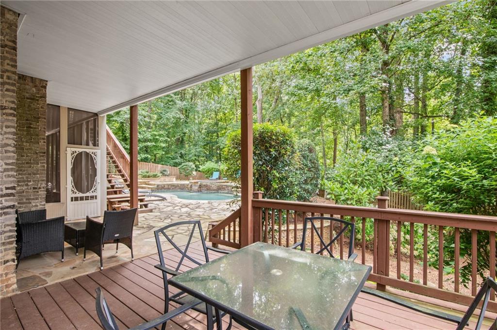 5053 Chapel Crossing Road Douglasville, GA 30135 - Photo 69 of 94 a view of a balcony with wooden floor and outdoor seating