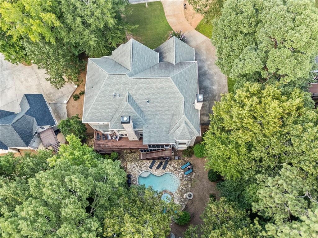 5053 Chapel Crossing Road Douglasville, GA 30135 - Photo 74 of 94 an aerial view of a house with a yard and garden