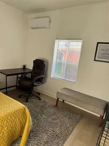 a living room with a couch and a table