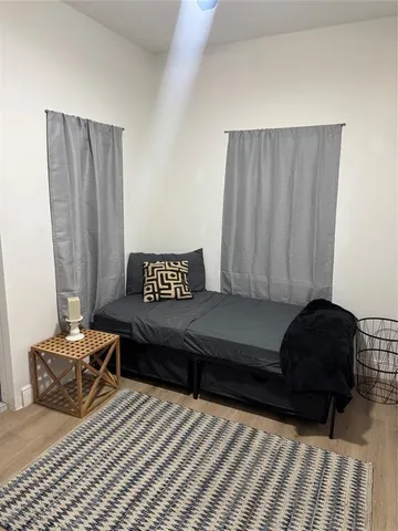 a living room with furniture and a gate