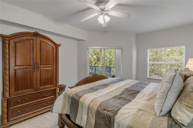 a bathroom with a granite countertop sink mirror and double
