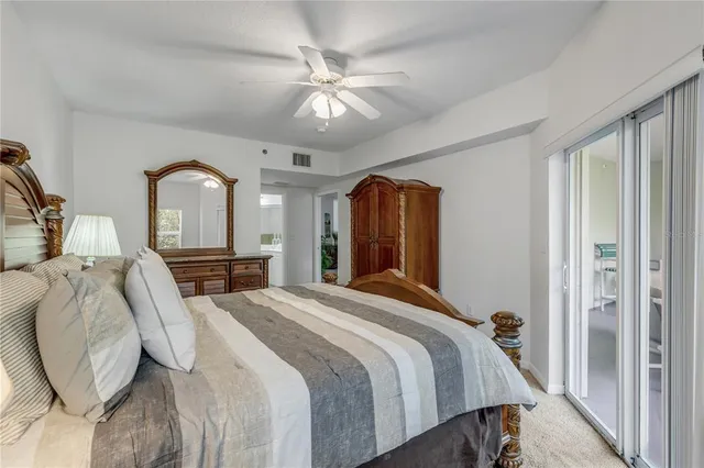 a bathroom with a sink vanity granite and a mirror