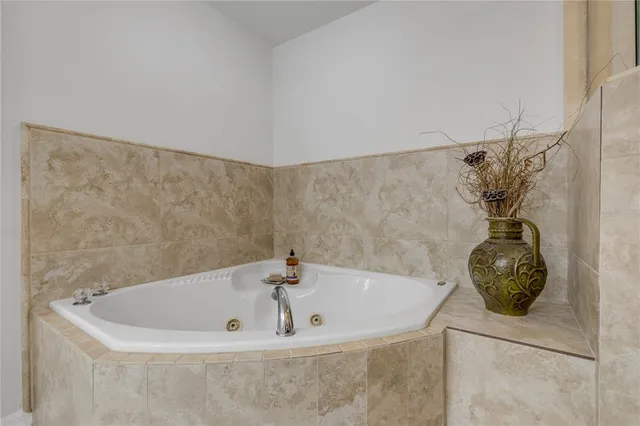 a bedroom with a bed and furniture