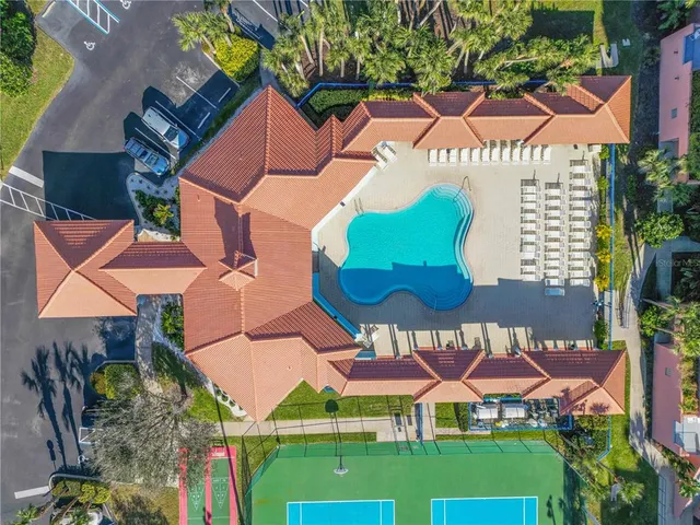 a view of a swimming pool with a sitting space