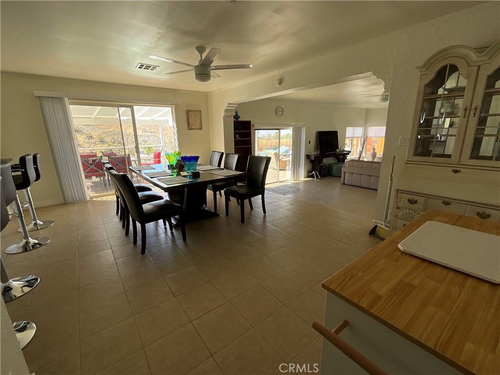 73405 Rask Road Desert Hot Springs, CA 92241 - Photo 20 of 26 a view of a dining room with furniture