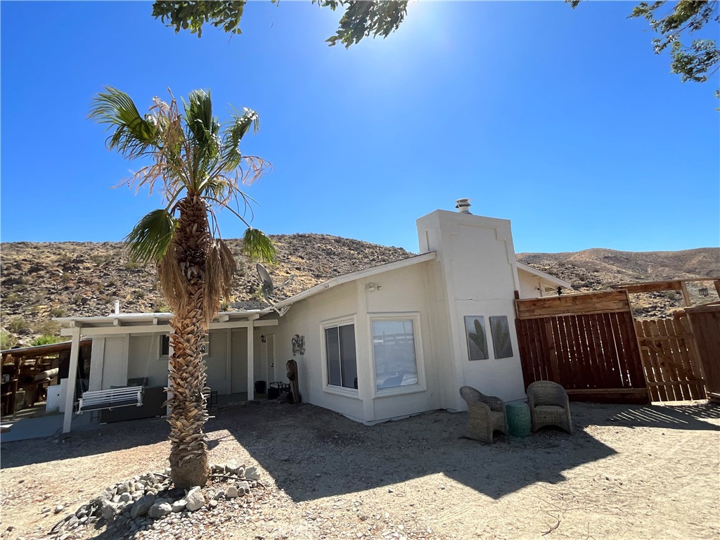 73405 Rask Road Desert Hot Springs, CA 92241 - Photo 26 of 26 a view of a terrace with a chair