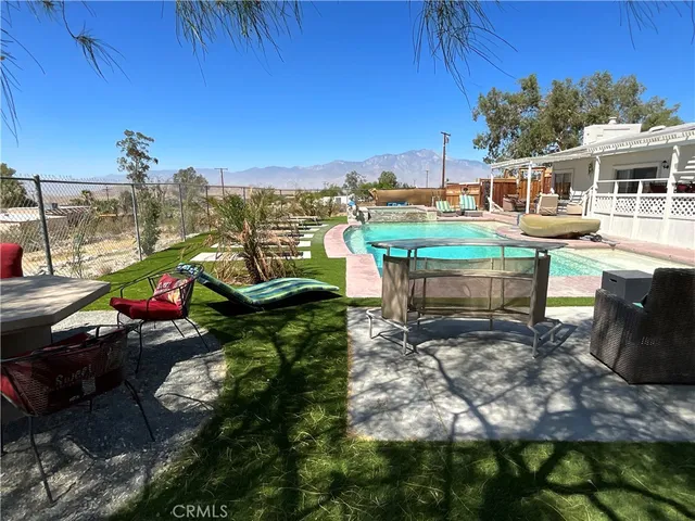 a view of a houses with a yard