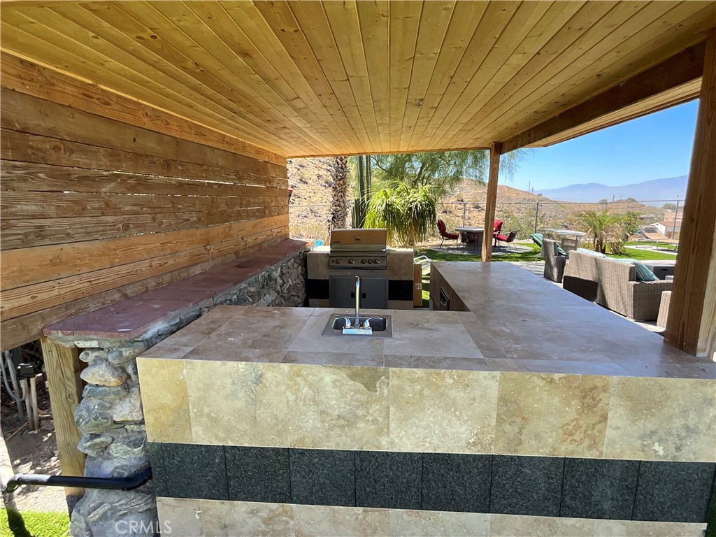 73405 Rask Road Desert Hot Springs, CA 92241 - Photo 10 of 26 a view of swimming pool with outdoor seating