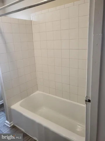 a bathroom with a bathtub