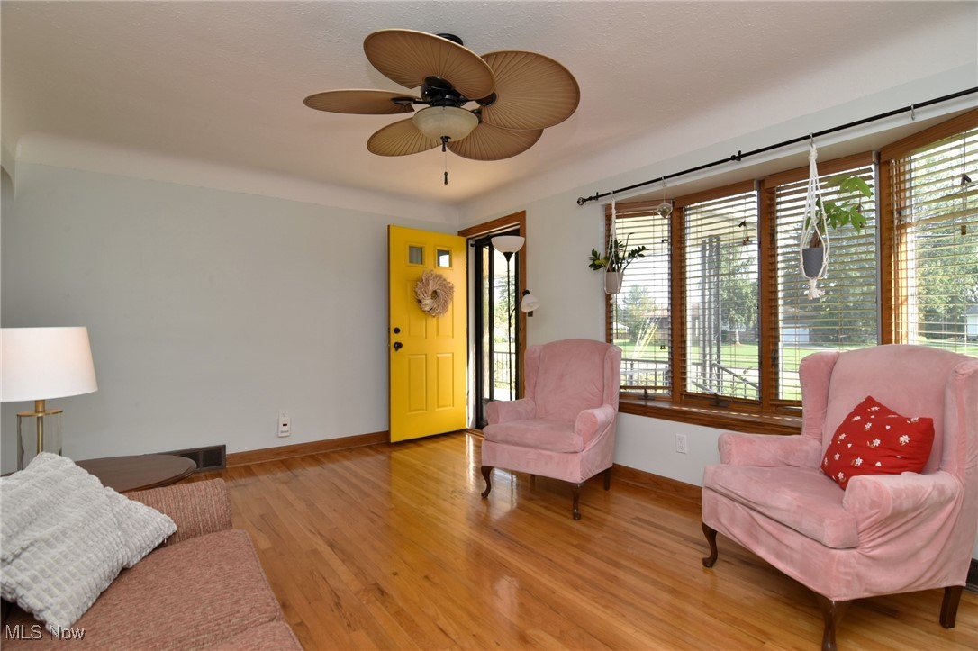 317 Nobottom Road Berea, OH 44017 - Photo 10 of 49 Living area featuring light wood-type flooring and ceiling fan
