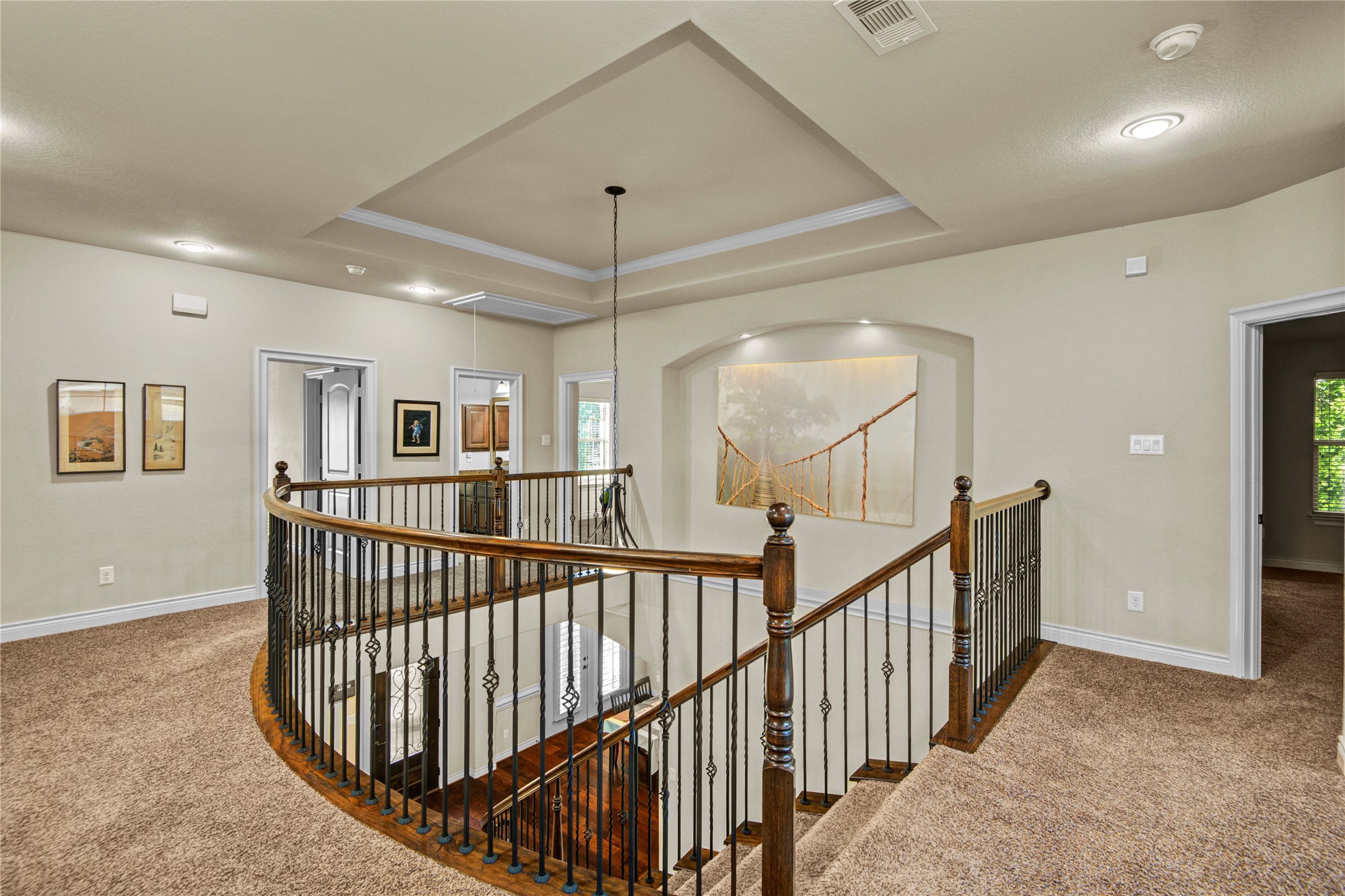 4315 Sanctuary Halls Spring, TX 77388 - Photo 30 of 50 a view of staircase with wooden floor and chandelier