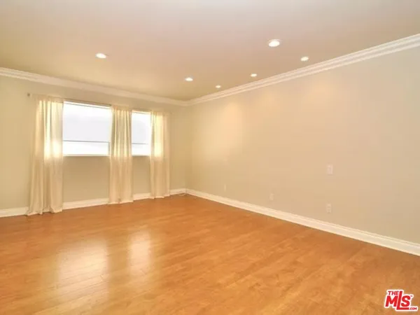 a bathroom with a granite countertop sink mirror and shower