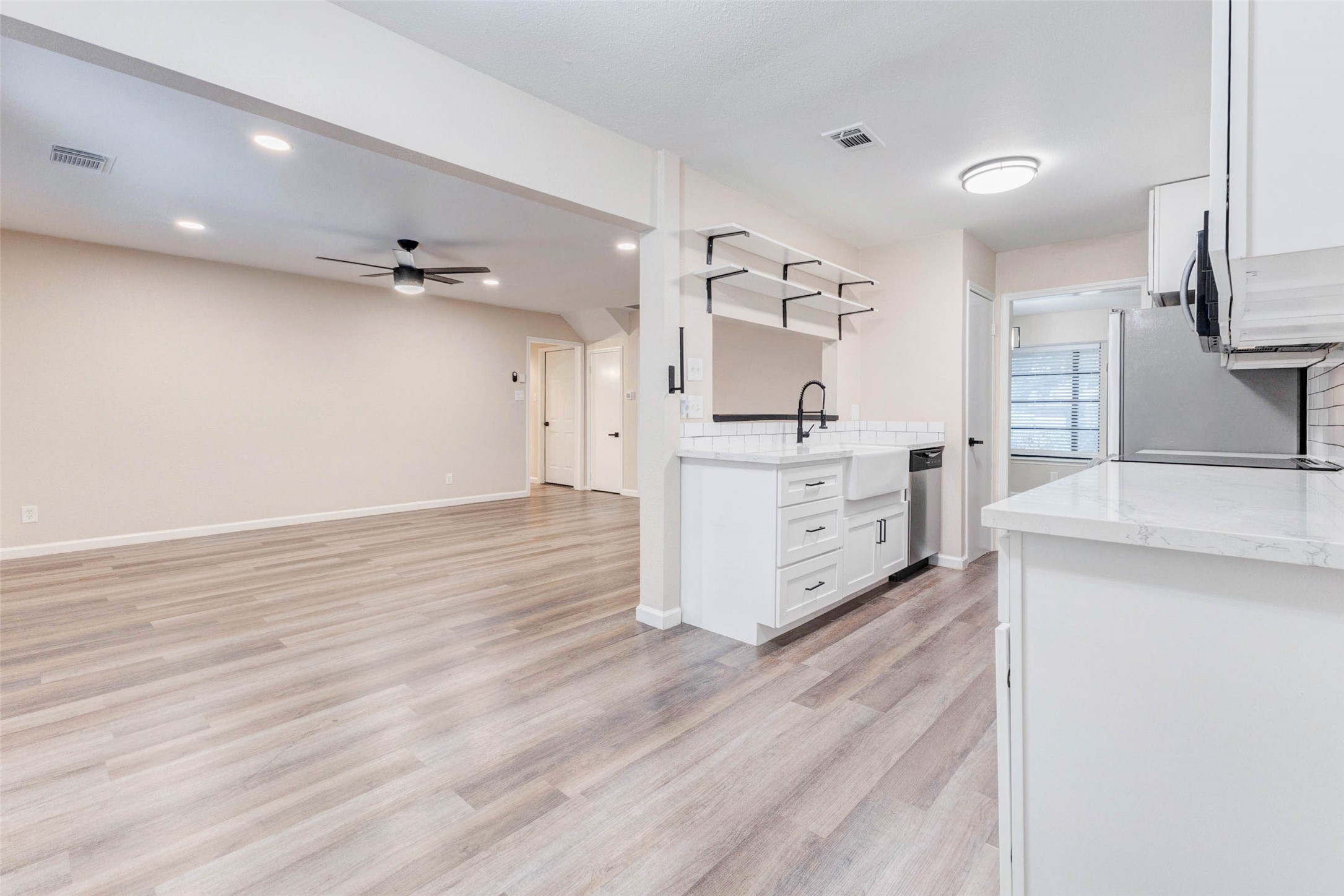 11222 Sagepark Lane Houston, TX 77089 - Photo 13 of 41 a view of a kitchen with wooden floor