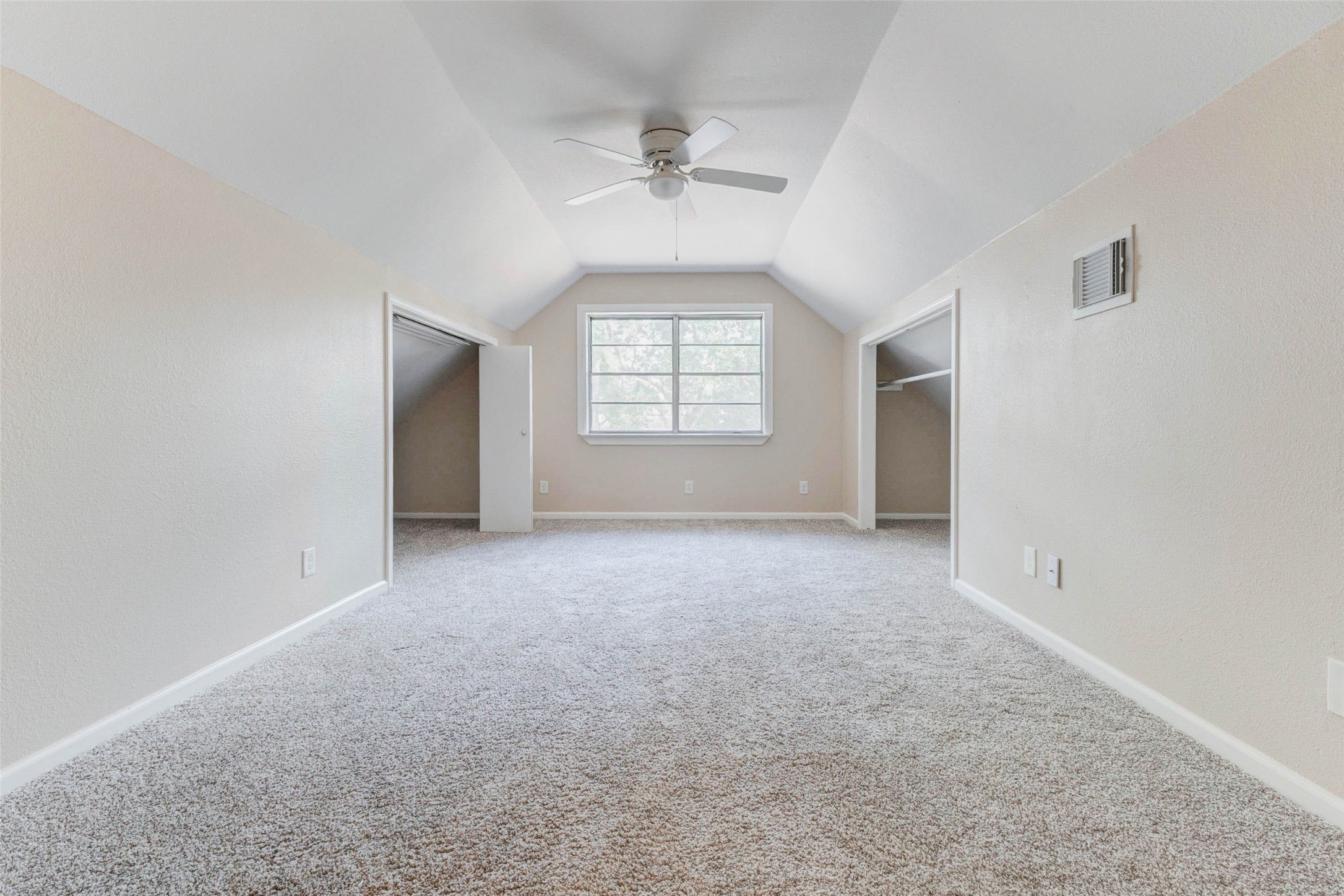 11222 Sagepark Lane Houston, TX 77089 - Photo 25 of 41 an empty room with a ceiling fan and window