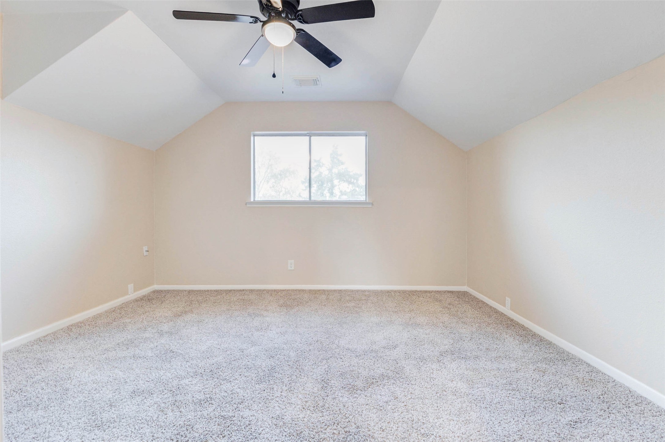 11222 Sagepark Lane Houston, TX 77089 - Photo 27 of 41 an empty room with a window and a fan