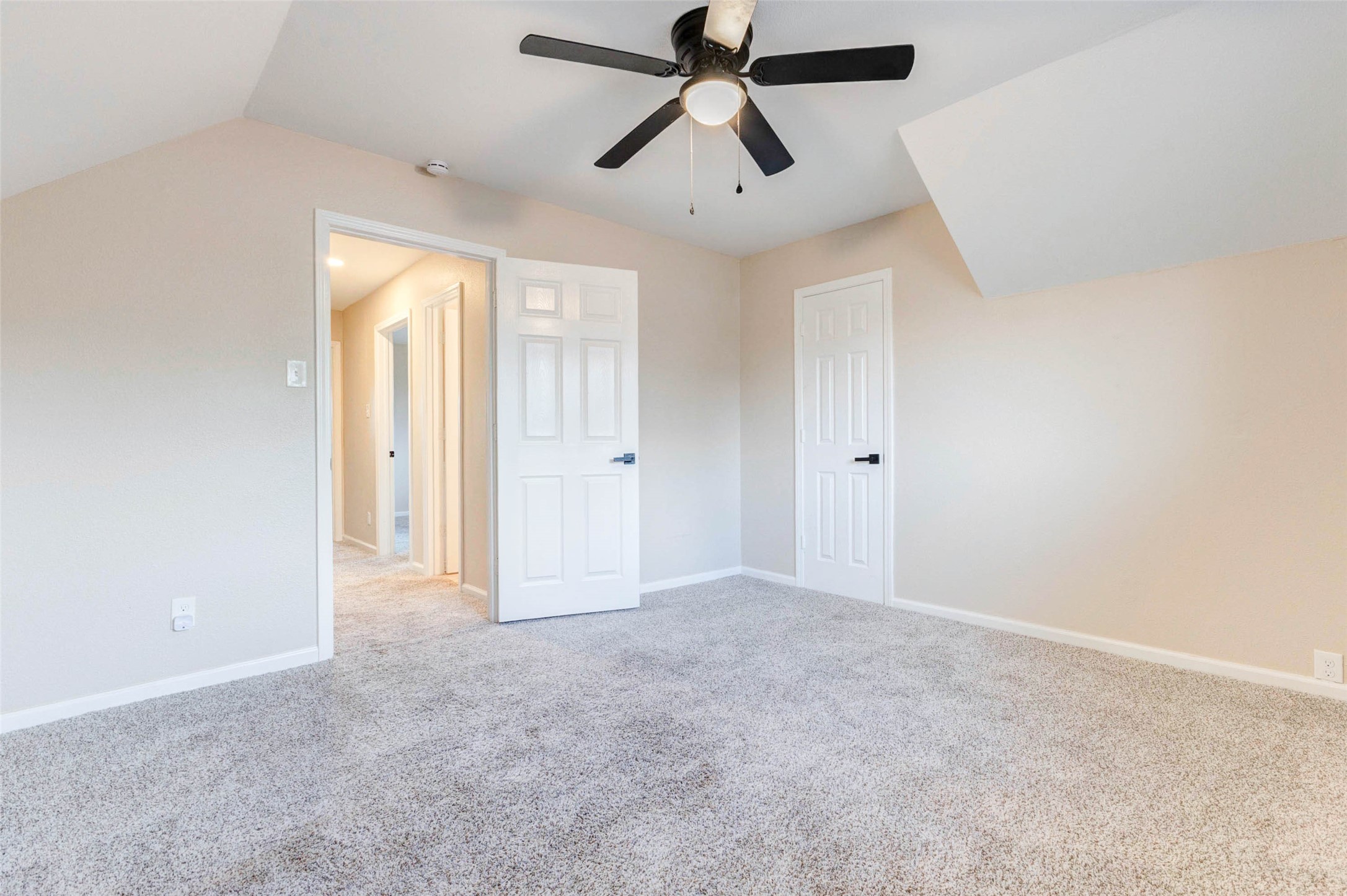 11222 Sagepark Lane Houston, TX 77089 - Photo 28 of 41 an empty room with closet and a chandelier fan