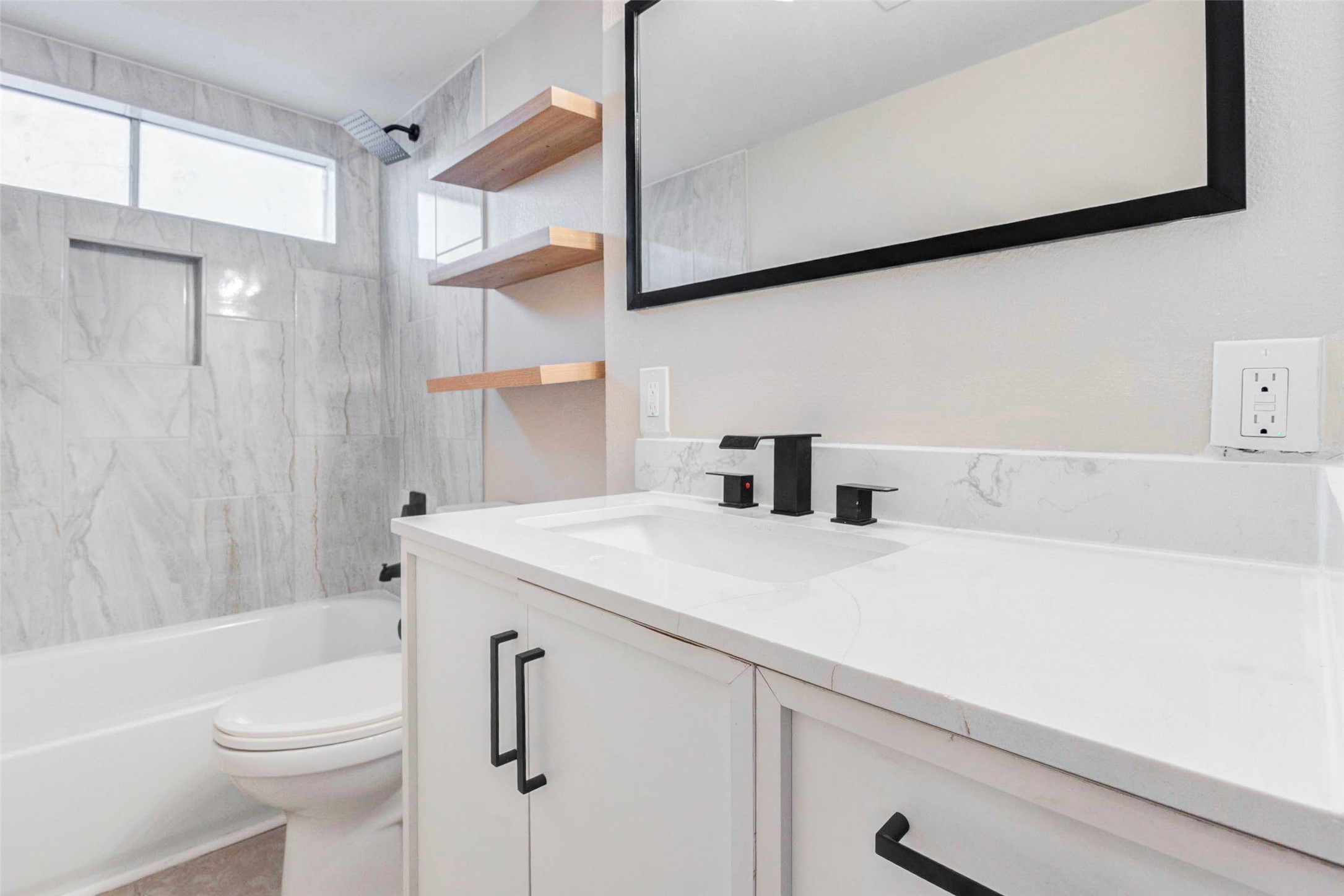 11222 Sagepark Lane Houston, TX 77089 - Photo 29 of 41 a bathroom with a sink a toilet and shower