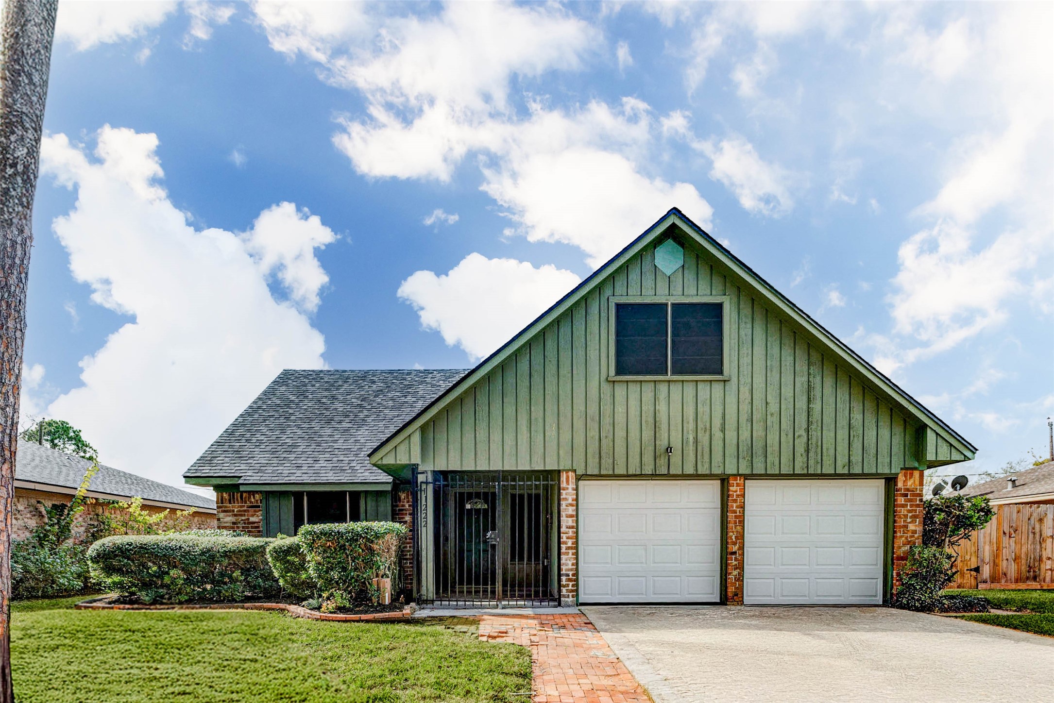11222 Sagepark Lane Houston, TX 77089 - Photo 3 of 41 a front view of a house with garden