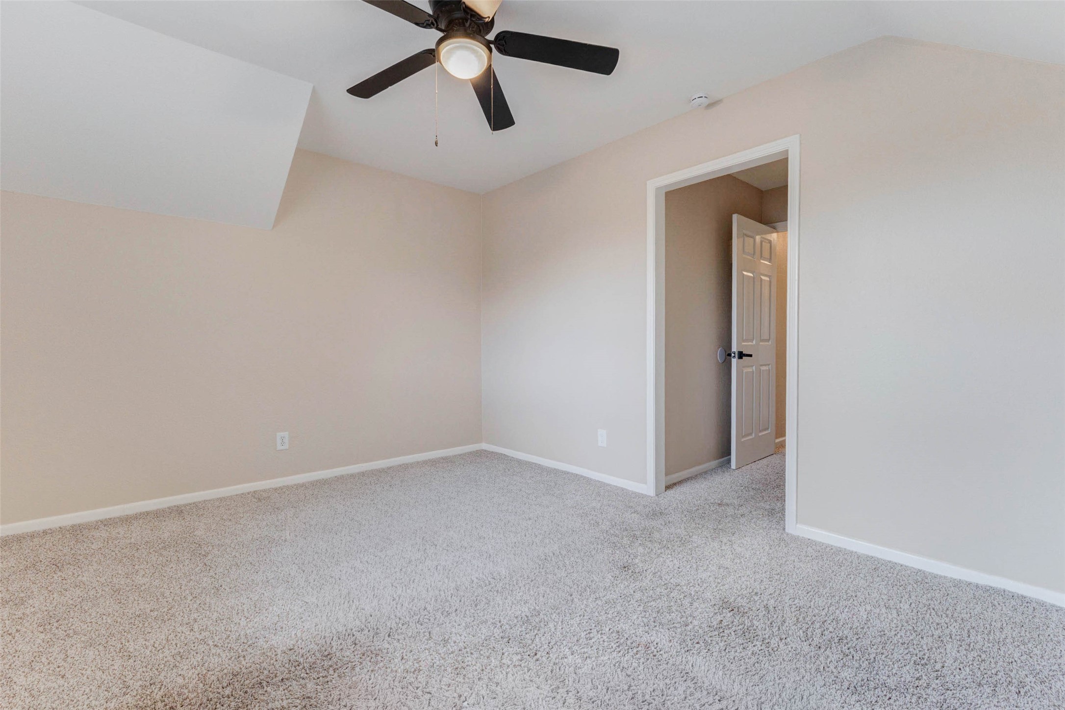11222 Sagepark Lane Houston, TX 77089 - Photo 32 of 41 an empty room with a window and a fan